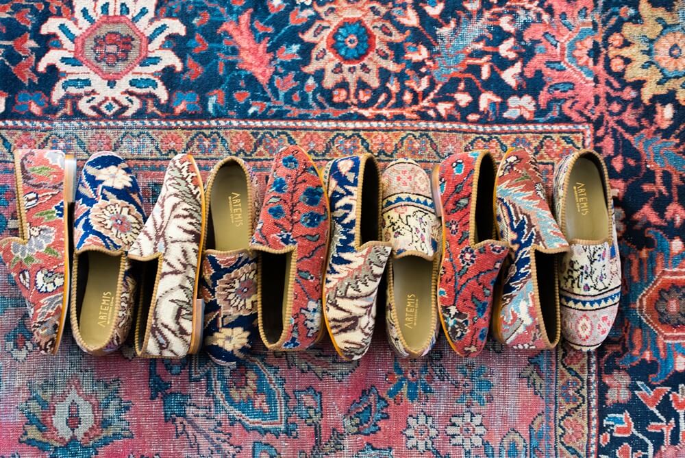 row of oriental carpet smoking shoes on an oriental carpet