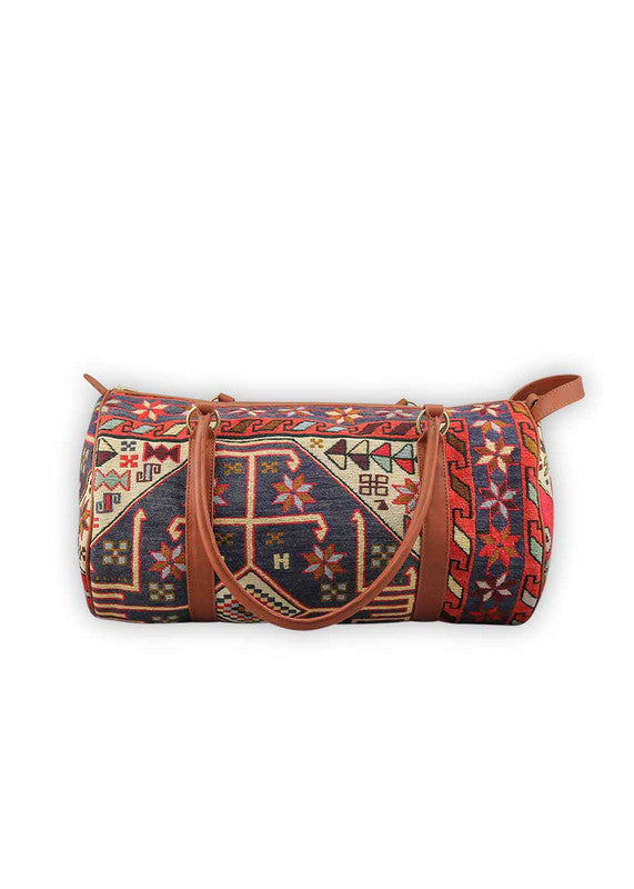 The Artemis Design & Co Travel Duffle Bag is a vibrant travel essential, boasting a lively color combination of red, white, blue, cream, orange, green, and maroon. Meticulously crafted, this duffle bag seamlessly blends patriotic and earthy tones, creating a dynamic and stylish companion for your journeys. The interplay of colors, from the patriotic red, white, and blue to the warm cream, energetic orange, lush green, and rich maroon, adds a playful and modern flair. (Front View)