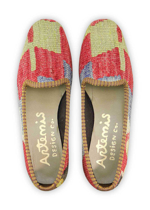 Artemis Design & Co Women's Loafers radiate vibrant style with a dynamic color palette of red, blue, green, white, black, and orange. Meticulously crafted, these loafers seamlessly blend bold and fresh tones, creating a versatile and eye-catching footwear option. (Front View)