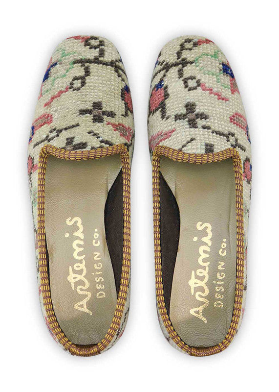Artemis Design & Co Women's Loafers elevate your style with a tasteful color palette of khaki, peach, blue, white, brown, green, and grey. Meticulously crafted, these loafers seamlessly blend earthy and cool tones, creating a versatile and sophisticated footwear option.  (Front View)