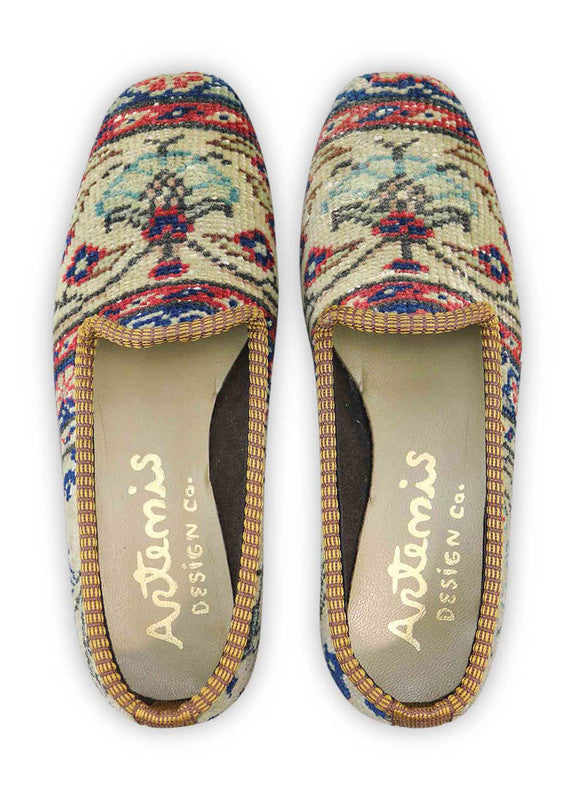 Artemis Design & Co Women's Loafers elevate your style with a tasteful color palette of khaki, peach, blue, white, brown, green, and grey. Meticulously crafted, these loafers seamlessly blend earthy and cool tones, creating a versatile and sophisticated footwear option.  (Front View)