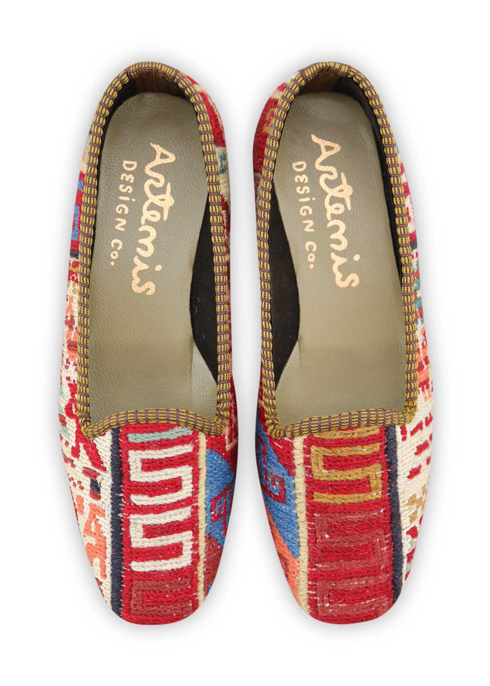 Artemis Shoes presents its women's loafers with a captivating color combination. The bold red exudes confidence and style, while the clean white offers a classic and timeless touch. The khaki adds a touch of earthy refinement, while the blue brings a cool and versatile element to the design. (Front View)