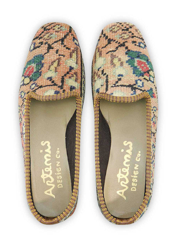 Artemis Design & Co Women's Loafers exude contemporary elegance with a striking color palette of red, black, dark grey, peach, blue, and white. These chic loafers seamlessly blend bold and neutral tones, creating a versatile footwear option that effortlessly complements any outfit.  (Front View)
