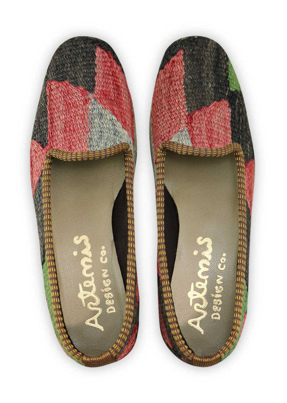 Artemis Design Co. Women's Loafers showcase a bold and classic color palette of black, red, blue, and green. Meticulously crafted, these loafers seamlessly blend timeless and vibrant tones, creating a versatile and stylish footwear option. The dynamic interplay of colors, from the classic black to the energetic reds, blues, and greens, adds a touch of modern flair. (Front View)
