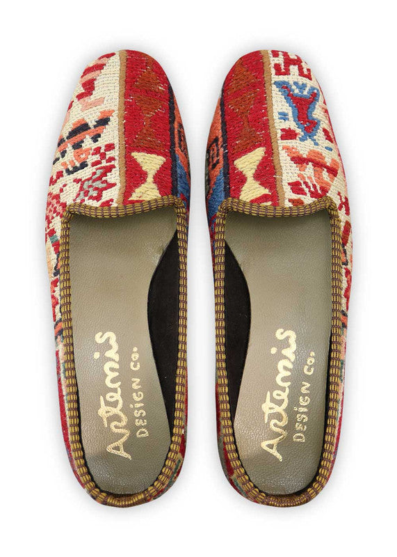 Artemis Design Co. Women's Loafers radiate modern charm with a lively color palette of red, white, black, sky blue, peach, and blue. Meticulously crafted, these loafers seamlessly blend classic and vibrant tones, creating a versatile and stylish footwear option. The dynamic interplay of colors, from the bold reds and blues to the crisp white, classic black, and soft peach, adds a touch of contemporary flair. (Front View)