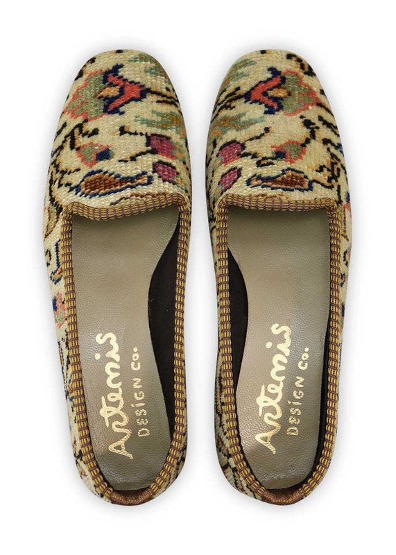 Artemis Design Co. Women's Loafers exude timeless elegance with a refined color palette of khaki, blue, red, and brown. Meticulously crafted, these loafers seamlessly blend earthy and vibrant tones, creating a versatile and stylish footwear option. The dynamic interplay of colors, from the classic khaki and brown to the bold blues and reds, adds a touch of modern flair. (Front View)