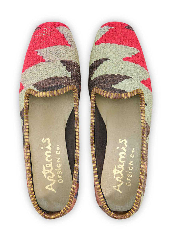 Artemis Design & Co Women's Loafers exude contemporary elegance with a striking color palette of red, black, dark grey, peach, blue, and white. These chic loafers seamlessly blend bold and neutral tones, creating a versatile footwear option that effortlessly complements any outfit. (Front View)