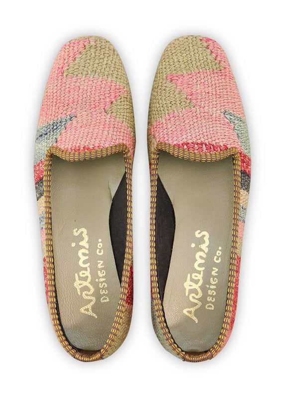 Artemis Design & Co Women's Loafers showcase a sophisticated and stylish color palette, featuring shades of peach, khaki, red, black, grey, pink, and dark grey. These meticulously designed loafers seamlessly blend warmth with neutral tones, creating a versatile footwear option that effortlessly transitions from casual to chic. (Front View)