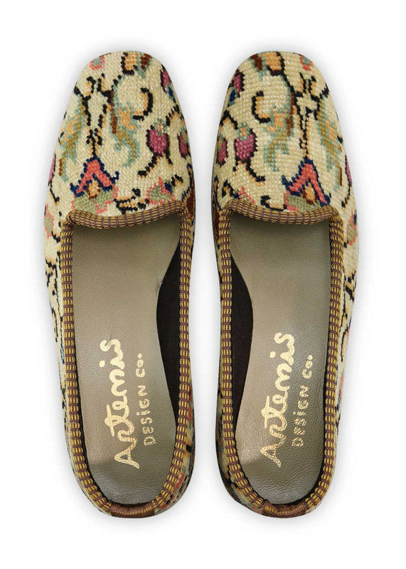 Artemis Design Co. Women's Loafers exude timeless elegance with a refined color palette of khaki, blue, red, and brown. Meticulously crafted, these loafers seamlessly blend earthy and vibrant tones, creating a versatile and stylish footwear option. The dynamic interplay of colors, from the classic khaki and brown to the bold blues and reds, adds a touch of modern flair. (Front View)