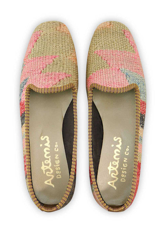 Artemis Design & Co Women's Loafers showcase a sophisticated and stylish color palette, featuring shades of peach, khaki, red, black, grey, pink, and dark grey. These meticulously designed loafers seamlessly blend warmth with neutral tones, creating a versatile footwear option that effortlessly transitions from casual to chic. (Front View)