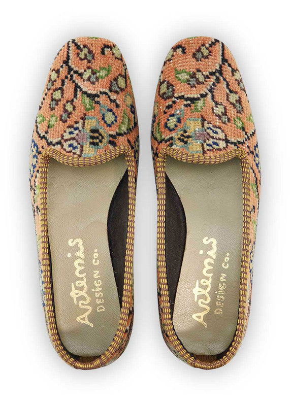 Artemis Design & Co Women's Loafers showcase a harmonious blend of earthy sophistication with a touch of cool hues. The color palette features rich tones of brown and khaki,peach complemented by crisp white, serene blue, and refreshing green. (Front View)