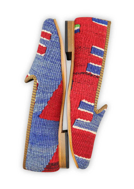 Artemis Design & Co Women's Loafers radiate vibrant energy with a captivating color trio of red, blue, and green. These stylish loafers are a bold expression of modern flair, seamlessly blending primary hues for a dynamic and eye-catching look. (Side View)