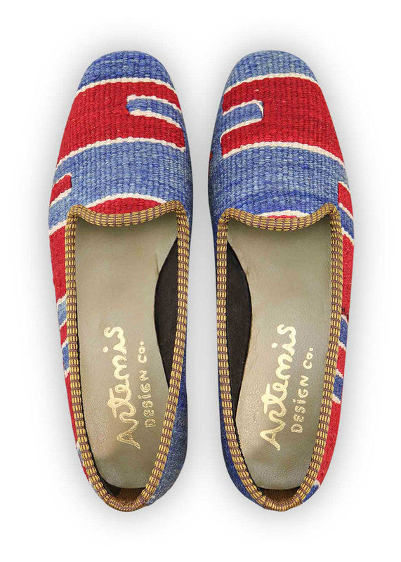 Artemis Design & Co Women's Loafers radiate vibrant energy with a captivating color trio of red, blue, and green. These stylish loafers are a bold expression of modern flair, seamlessly blending primary hues for a dynamic and eye-catching look. (Front View)