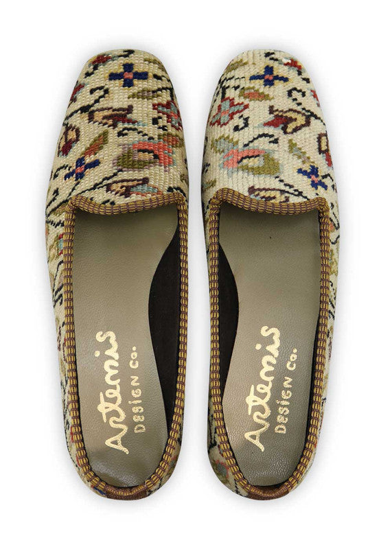 Artemis Design Co. Women's Loafers exude timeless elegance with a refined color palette of khaki, blue, red, and brown. Meticulously crafted, these loafers seamlessly blend earthy and vibrant tones, creating a versatile and stylish footwear option. The dynamic interplay of colors, from the classic khaki and brown to the bold blues and reds, adds a touch of modern flair.  (Front View)