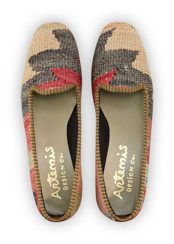 Artemis Design Co. Women's Loafers showcase a delightful color palette of peach, grey, red, khaki, pink, and blue. Meticulously crafted, these loafers seamlessly blend warm and cool tones, creating a versatile and stylish footwear option. The dynamic interplay of colors, from the soft peach and pink to the classic red, and the muted greys, khakis, and blues, adds a touch of modern flair. (Front View)