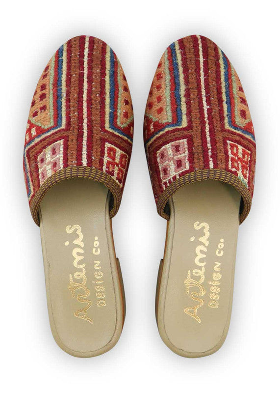 The Artemis Women's Slides feature a chic color combination of white, red, brown, grey, and light orange. These slides offer a balanced mix of bold and neutral tones, creating a stylish and versatile look. (Front View)