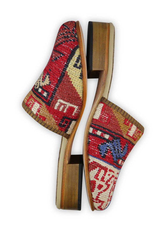 The Artemis Women's Slides feature a chic color combination of white, red, brown, grey, and light orange. These slides offer a balanced mix of bold and neutral tones, creating a stylish and versatile look. (Side View)