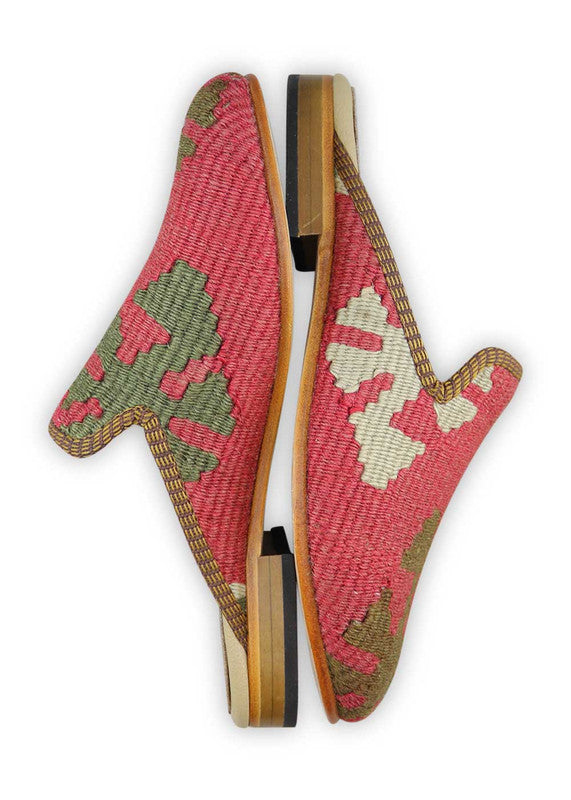 The Artemis Design& Co Women's Slippers in the red, green, and white color combination are a fashionable and comfortable choice for women. Made with high-quality materials and attention to detail, these slippers offer durability and long-lasting comfort. (Side View)