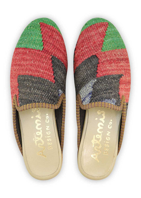 The Artemis Design& Co Women's Slippers in the color combination of green, red, black, and blue are a fashionable and comfortable choice for women. These slippers are crafted with high-quality materials, ensuring durability and long-lasting comfort. (Front View)