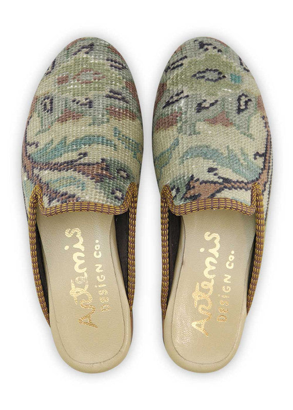 The Artemis Design& Co Women's Slippers in white, brown, blue, green, and navy blue color combination are the perfect blend of style and comfort. Made with high-quality materials and attention to detail, these slippers offer durability and long-lasting comfort. (Front View)