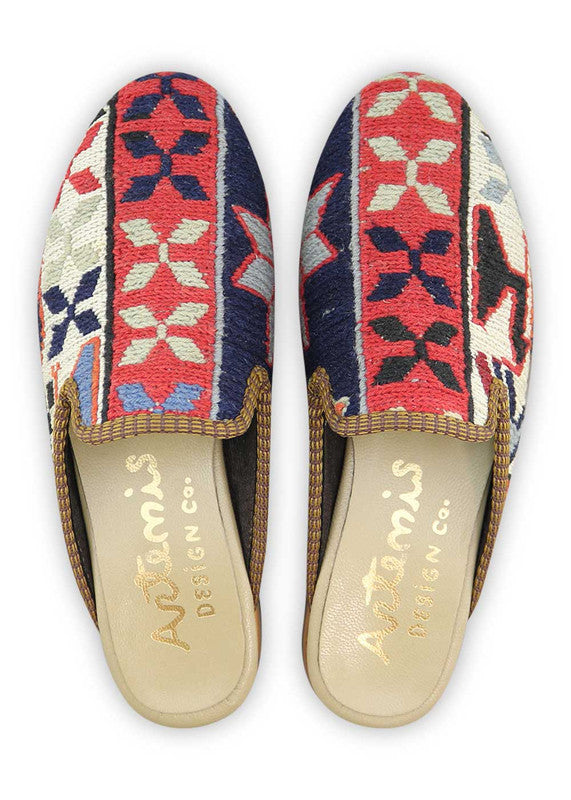 The Artemis Design& Co Women's Slippers are a fashionable and comfortable choice for any woman. These slippers come in a stunning color combination of navy blue, sky blue, red, orange, white, and grey. Made with high-quality materials and attention to detail, these slippers are durable and long-lasting. (Front View)