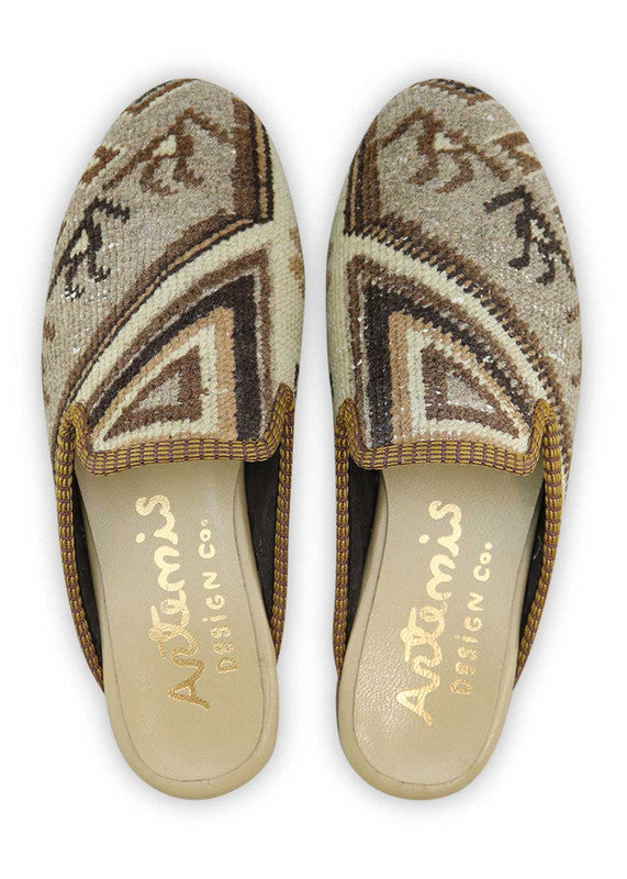 Artemis Design& Co Women's Slippers are the perfect combination of style and comfort. These slippers come in a beautiful color combination of khaki, blue, brown, and white. Crafted with high-quality materials and attention to detail, they offer long-lasting comfort and durability. (Front View)