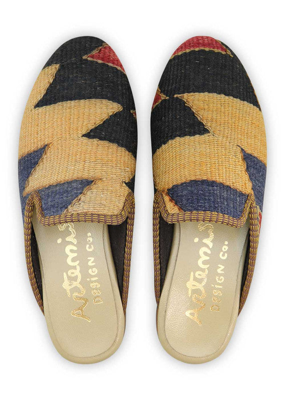 The Artemis Design& Co Women's Slippers in the color combination of red, black, blue, and mustard are a fashionable and comfortable choice for women. These slippers are crafted with high-quality materials and attention to detail, ensuring durability and long-lasting comfort. (Front View)
