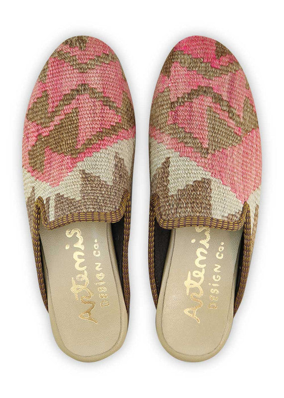 The Artemis Design& Co Women's Slippers in the color combination of brown, white, and light red are a stylish and comfortable choice for women. These slippers are crafted with high-quality materials and attention to detail, ensuring durability and long-lasting comfort. (Front View)