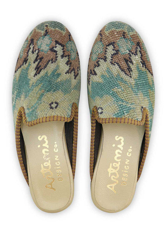 Artemis Design& Co Women's Slippers in the color combination of black, peach, blue, green, and grey are a perfect blend of style and comfort. With their high-quality materials and attention to detail, these slippers offer durability and long-lasting comfort.  (Front View)
