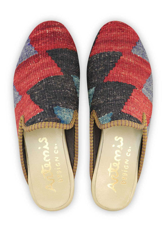 The Artemis Women's Slippers exude a dynamic blend of colors, featuring red, black, and blue. These slippers seamlessly blend the boldness of red with the classic appeal of black, complemented by the calming tones of blue.(Front View)