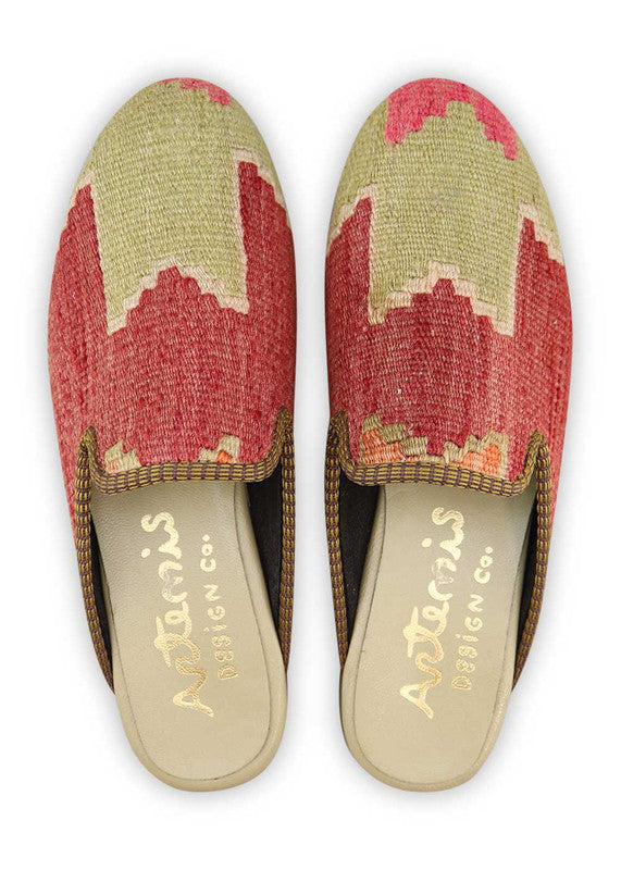 The Artemis Women's Slippers offer a vibrant and refreshing blend of colors, featuring red and lime. These slippers seamlessly blend the boldness of red with the lively burst of lime, creating a dynamic and eye-catching color combination. (Front View)