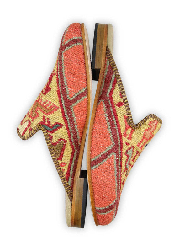 The Artemis Women's Slippers showcase a captivating spectrum of colors, featuring orange, brown, sky blue, khaki, cream, and maroon. These slippers seamlessly blend the vibrant bursts of orange with the natural warmth of brown and khaki, complemented by the calming shades of sky blue and cream, and enriched by the regal allure of maroon. (Side View)