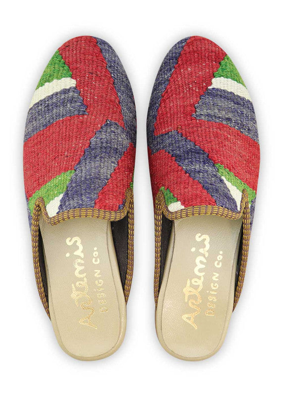 The Artemis Women's Slippers radiate a captivating blend of colors, featuring blue, red, green, and white. These slippers seamlessly merge the vibrant energy of blue and red with the fresh appeal of green, complemented by the classic charm of white. (Front View)