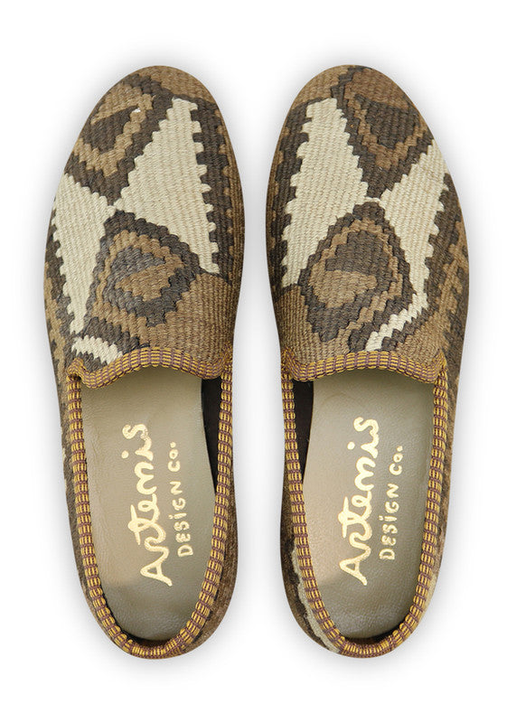 Artemis Design & Co Women's Smoking Shoes, featuring a timeless color combination of grey, white, khaki, brown, and cream, are a classic and versatile addition to your footwear collection. These handcrafted smoking shoes effortlessly blend fashion and comfort (Front View)