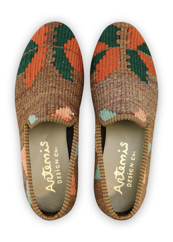 Artemis Design & Co Women's Smoking Shoes, adorned with a captivating color combination of moss green, rust, brown, white, and mint green, are a chic and unique addition to your footwear collection. These artisan-crafted smoking shoes seamlessly blend style and comfort. Their distinctive color palette adds a touch of charm and individuality to your fashion ensemble. (Front View)