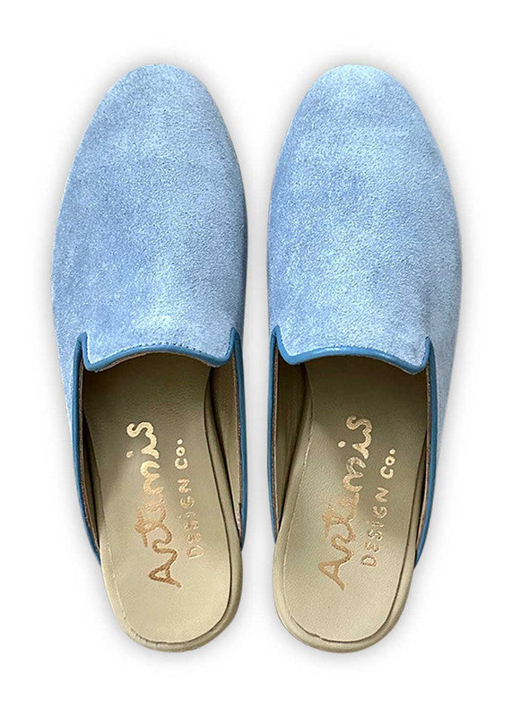 Artemis Design& Co Women's Slippers in color powder blue are a stylish and comfortable footwear option for women. Crafted with high-quality materials, these slippers offer both durability and comfort. The powder blue color adds a touch of elegance and sophistication to any outfit. (Front View)