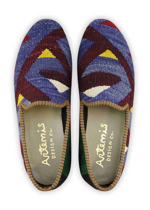 Artemis Shoes presents its men's loafers with a captivating color combination. The maroon hue adds a touch of sophistication and richness, while the dark blue exudes a sense of elegance and versatility. The light maroon offers a subtle and refined accent, complemented by the sleek black for a timeless and classic look. The dark green adds a touch of nature-inspired charm, while the red orange injects a bold and vibrant pop of color. (Front View)