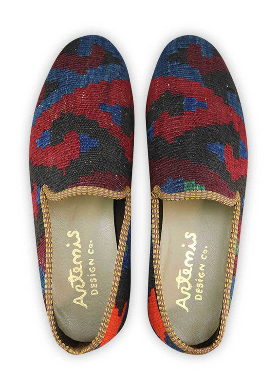 Artemis Shoes presents its men's loafers with a captivating color combination. The maroon hue adds a touch of sophistication and richness, while the dark blue exudes a sense of elegance and versatility. The light maroon offers a subtle and refined accent, complemented by the sleek black for a timeless and classic look. The dark green adds a touch of nature-inspired charm, while the red orange injects a bold and vibrant pop of color. (Front View)
