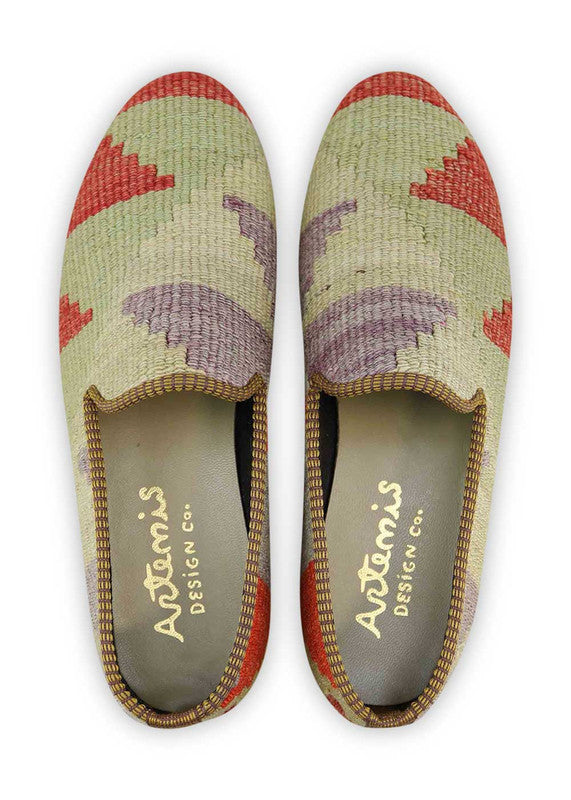 The regal purple brings an air of sophistication, while the light green adds a fresh and vibrant touch. The bold red provides a confident and eye-catching accent, perfectly complemented by the clean and timeless white. With Artemis Shoes' color combination loafers, you can effortlessly elevate your style and make a statement that is both refined and bold. (Front View)