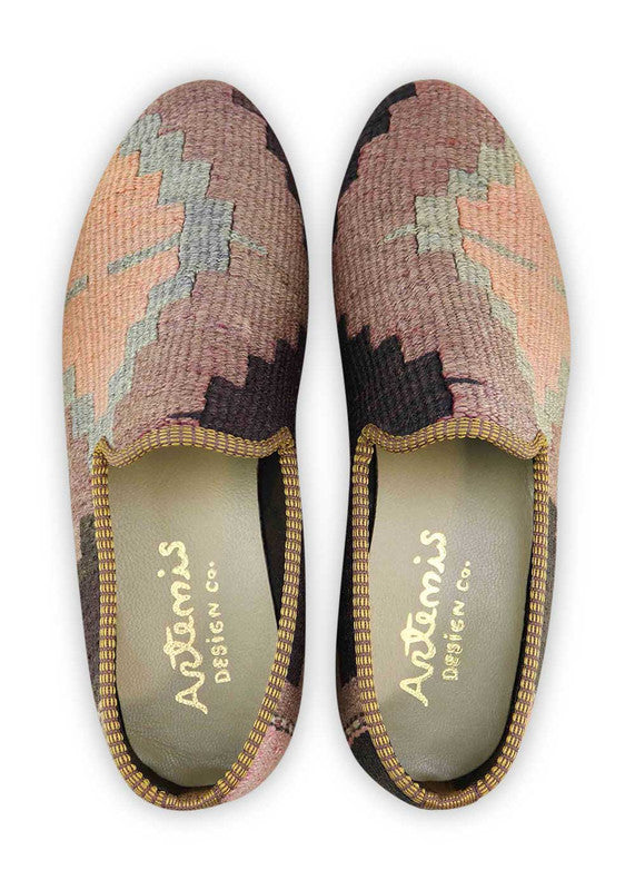 mens-loafers-MLF130-K0109The soft peach hue adds a touch of warmth and elegance, while the sky blue brings a fresh and calming element to the design. The vibrant purple adds a bold and regal flair, perfectly complemented by the sleek black for a timeless and versatile look. With Artemis Shoes' color combination loafers, you can express your unique style with a blend of sophistication and contemporary charm. (Front View)