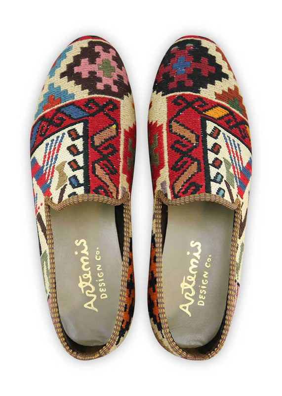 With hues of red, green, brown, gray, pink, black, and orange, these loafers offer a bold and versatile style. From the confident red to the refreshing green, the earthy brown to the understated gray, the playful pink to the timeless black, and the vibrant orange, these loafers allow you to express your unique fashion sense with flair. Elevate your look and make a statement with Artemis Shoes' color combination loafers. (Front View)