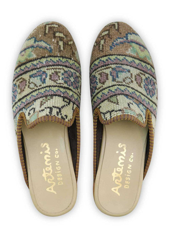The Artemis Men's Slippers showcase a soothing color combination of brown, lilac, khaki, and green. These slippers offer a gentle blend of earthy and soft tones, creating a comfortable and stylish look. (Front View)