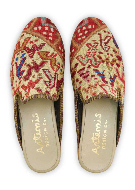 The Artemis Men's Slippers showcase a versatile color combination of red, white, brown, blue, and teal. These slippers offer a balanced mix of bold and neutral tones, creating a stylish and modern look. (Front View)