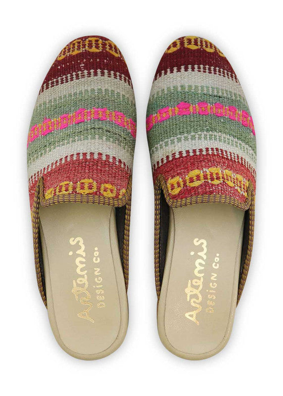 The Artemis Men's Slippers feature an engaging color combination of maroon, yellow orange, grey, dark grey, pink, and red. These slippers offer a lively mix of warm and neutral tones, creating a stylish and eye-catching look. (Front View)