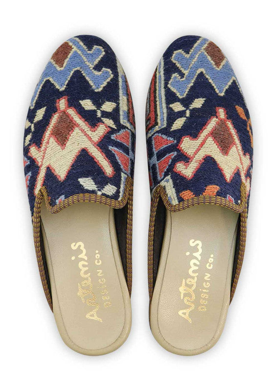 The Artemis Men's Slippers feature a refreshing color combination of blue, sky blue, peach, khaki, and brown. These slippers offer a harmonious mix of cool and warm tones, creating a stylish and versatile look. (Front View)