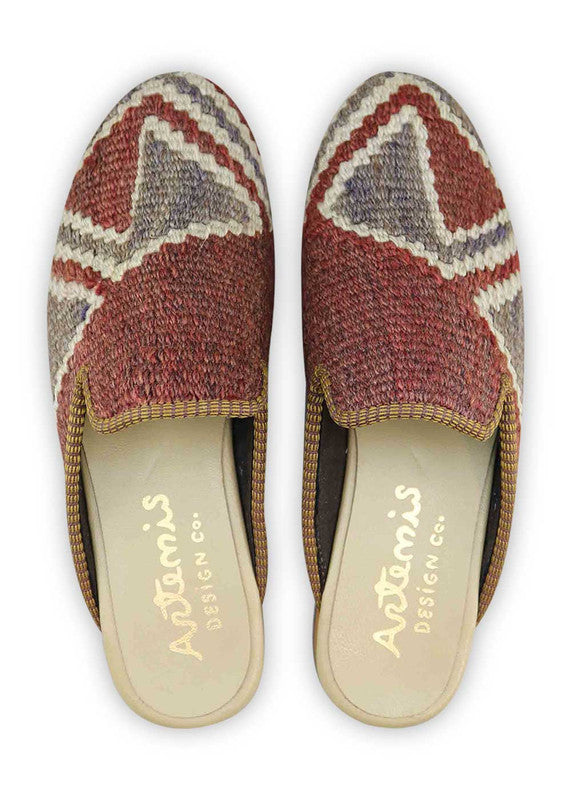 The Artemis Men's Slippers showcase a refined color combination of maroon, grey, and white. These slippers offer an elegant blend of rich and neutral tones, creating a sophisticated and versatile look. (Front View)