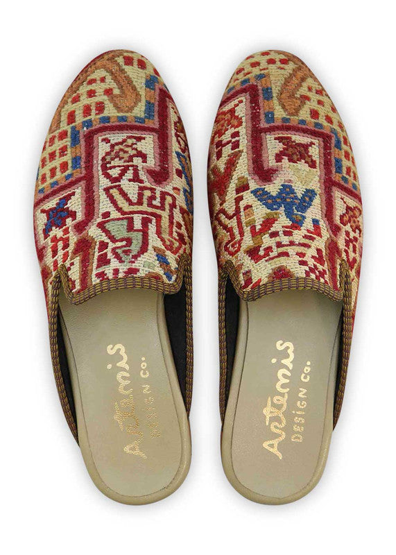 The Artemis Men's Slippers showcase a patriotic color combination of red, white, and blue, along with warm tones of brown and peach. These slippers offer a lively mix of bold and earthy hues, creating a stylish and eye-catching look. (Front View)