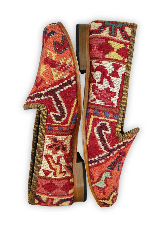 The Artemis Women's Loafer presents an eye-catching color combination of red, white, maroon, pink, khaki, teal grey, green, red orange, and brown. These loafers boast a playful mix of vibrant and earthy tones, creating a captivating and versatile look. (Side View)