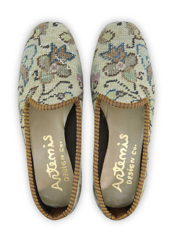 The Artemis Women's Loafer features a charming color combination of khaki, lilac, green, grey, blue, and brown. These loafers offer a delightful mix of earthy and pastel tones, creating a stylish and versatile look. (Front View)