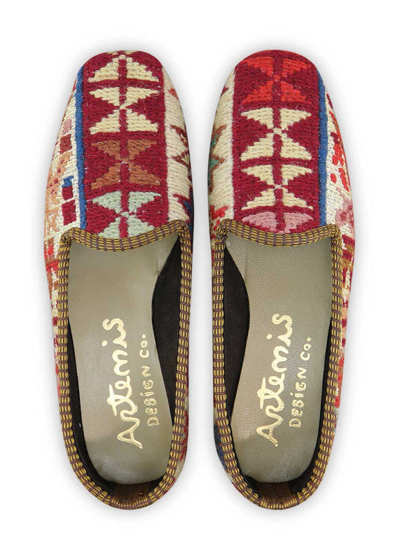 The Artemis Women's Loafer boasts a stunning and vibrant color combination, featuring shades of red, khaki, peach, white, green, and blue. With a chic and stylish design, these loafers offer both comfort and sophistication, making them the perfect accessory for any outfit. (Front View)